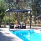 Pergola Bioclimatique aluminium anthracite 10,80 m2 et Toit avec lames ovales Habrita